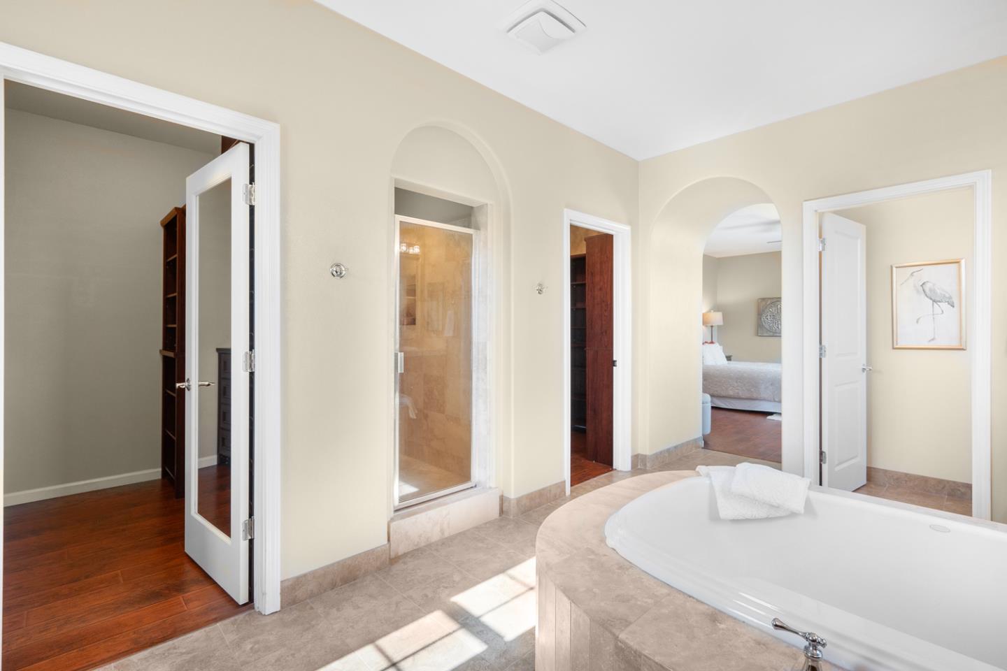 7180 Eagle Ridge Drive Gilroy, CA 95020 - Photo 38 of 63 a bedroom with a bed and wooden floor