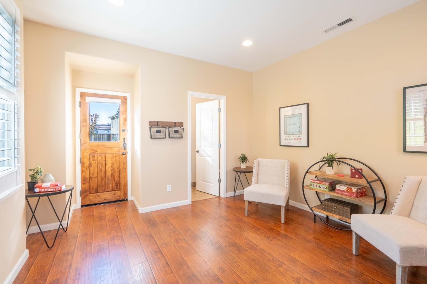 7180 Eagle Ridge Drive Gilroy, CA 95020 - Photo 45 of 63 a living room with furniture and a wooden floor