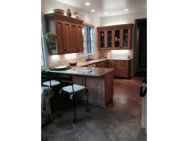 130 Alturas Drive Burlingame, CA 94010 - Photo 11 of 12 a room with a table and chairs