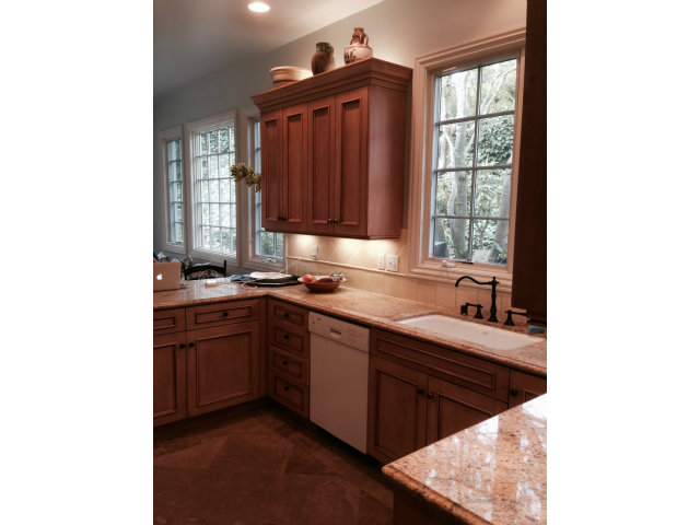130 Alturas Drive Burlingame, CA 94010 - Photo 7 of 12 a kitchen with stainless steel appliances granite countertop a sink window and cabinets