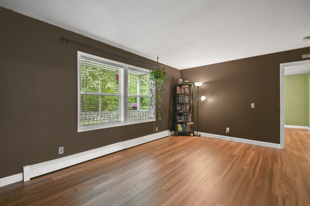 29 Prescott Street Rutland, MA 01543 - Photo 15 of 30 a view of an empty room with glass door and a window