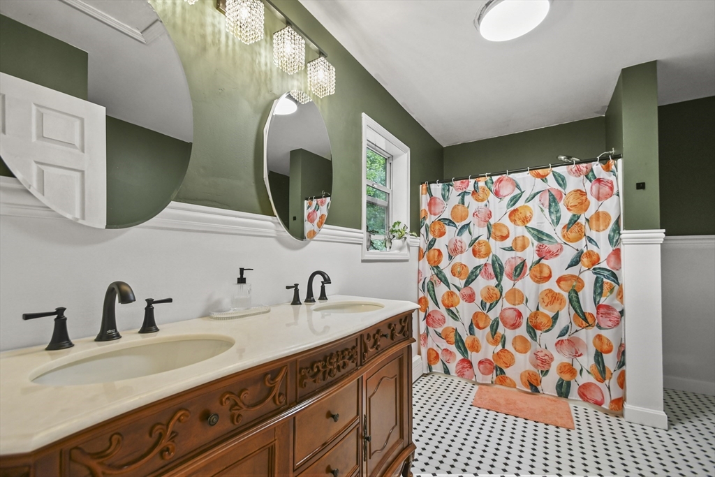 29 Prescott Street Rutland, MA 01543 - Photo 18 of 30 a bathroom with a sink and a mirror