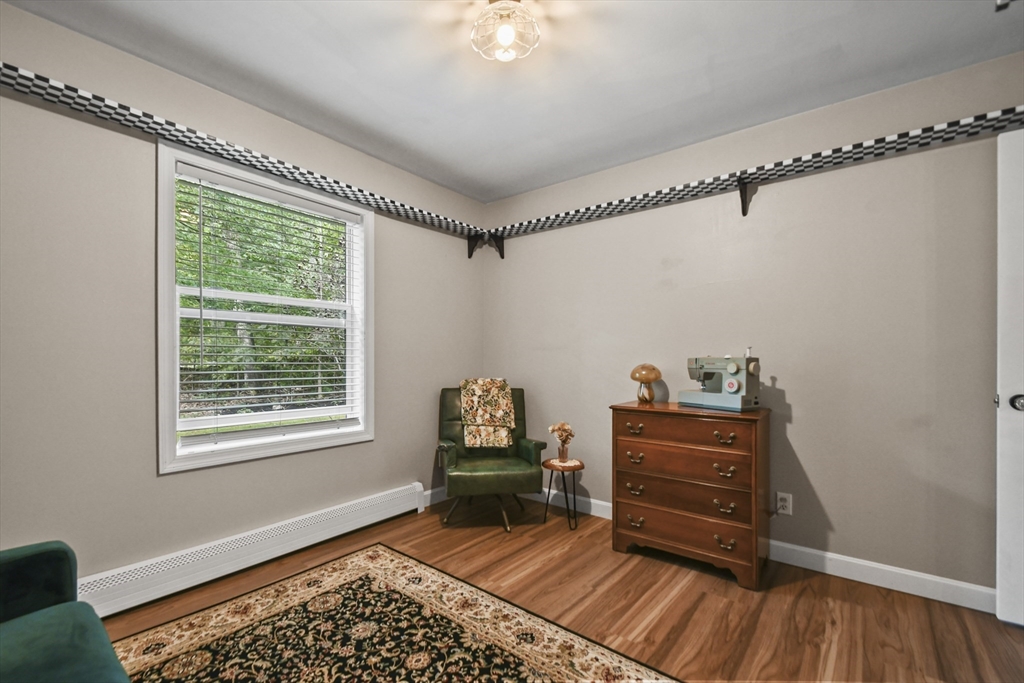 29 Prescott Street Rutland, MA 01543 - Photo 19 of 30 a room with toys and a wooden floor