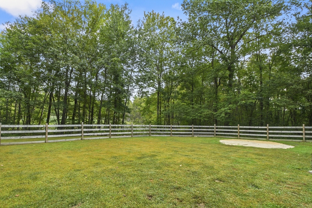 29 Prescott Street Rutland, MA 01543 - Photo 28 of 30 a view of outdoor space with swimming pool and trees in the background