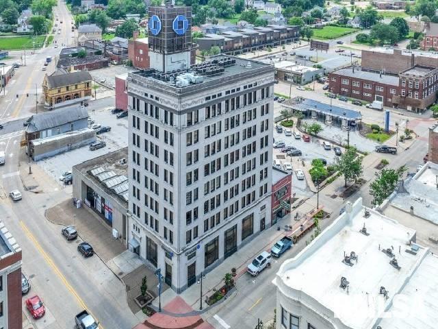 501 15th Street, Unit 504 Moline, IL 61265 - Photo 1 of 5 a city view with tall buildings