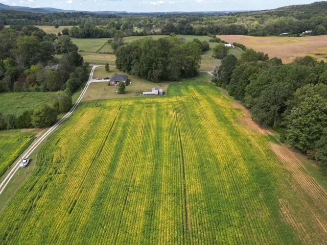 a view of swimming pool with a lake view