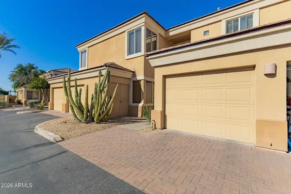 a front view of a house with a garage
