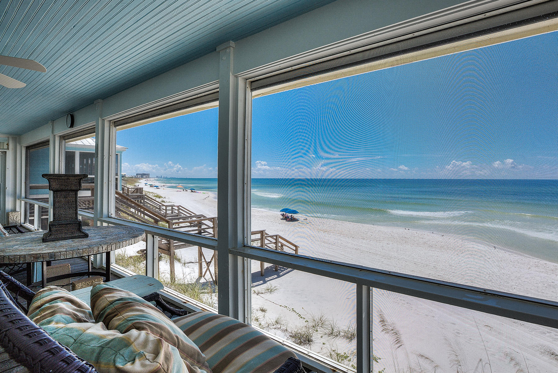 325 Pompano Street Inlet Beach, FL 32461 - Photo 16 of 49 a view of a balcony dining room and furniture