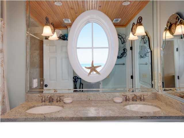 325 Pompano Street Inlet Beach, FL 32461 - Photo 24 of 49 a bathroom with a sink and a mirror