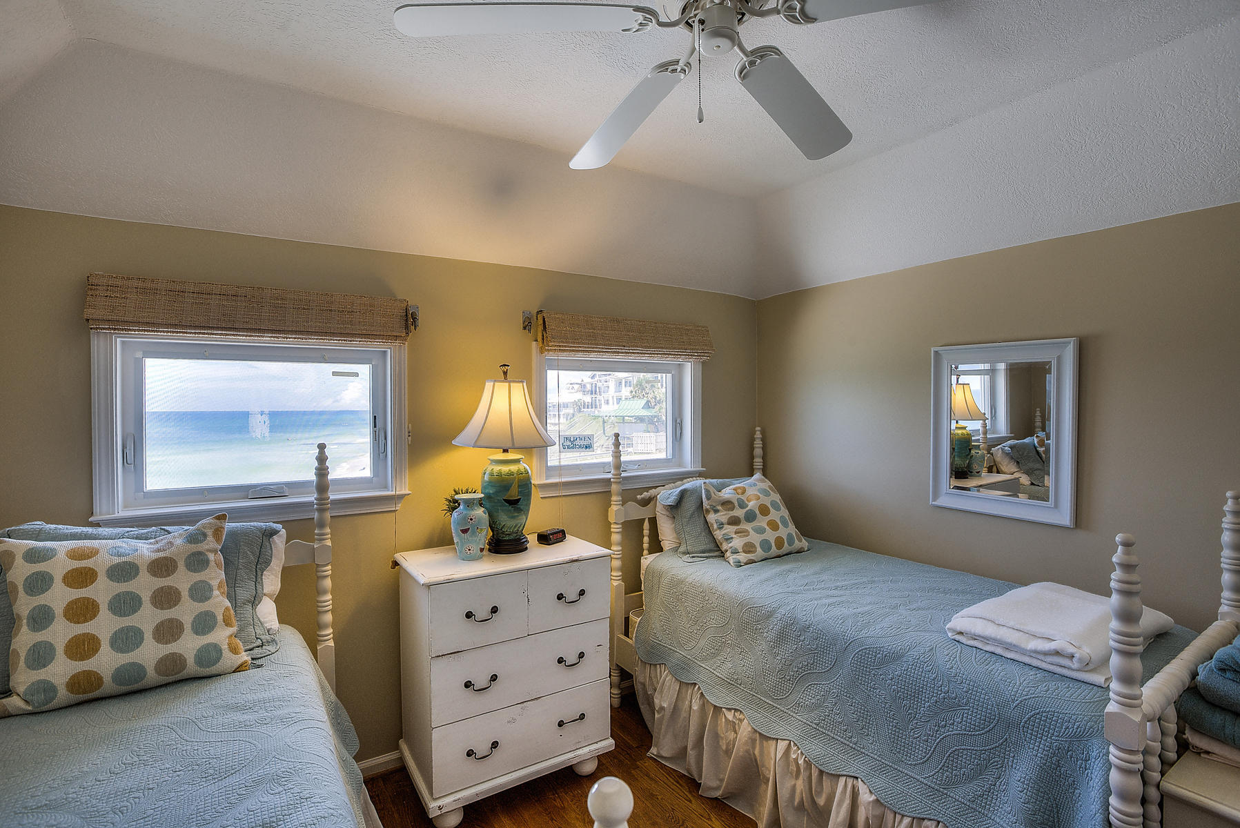 325 Pompano Street Inlet Beach, FL 32461 - Photo 27 of 49 a bedroom with a bed and a dresser