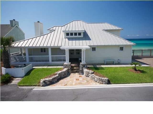 325 Pompano Street Inlet Beach, FL 32461 - Photo 4 of 49 a view of a house with a yard and porch
