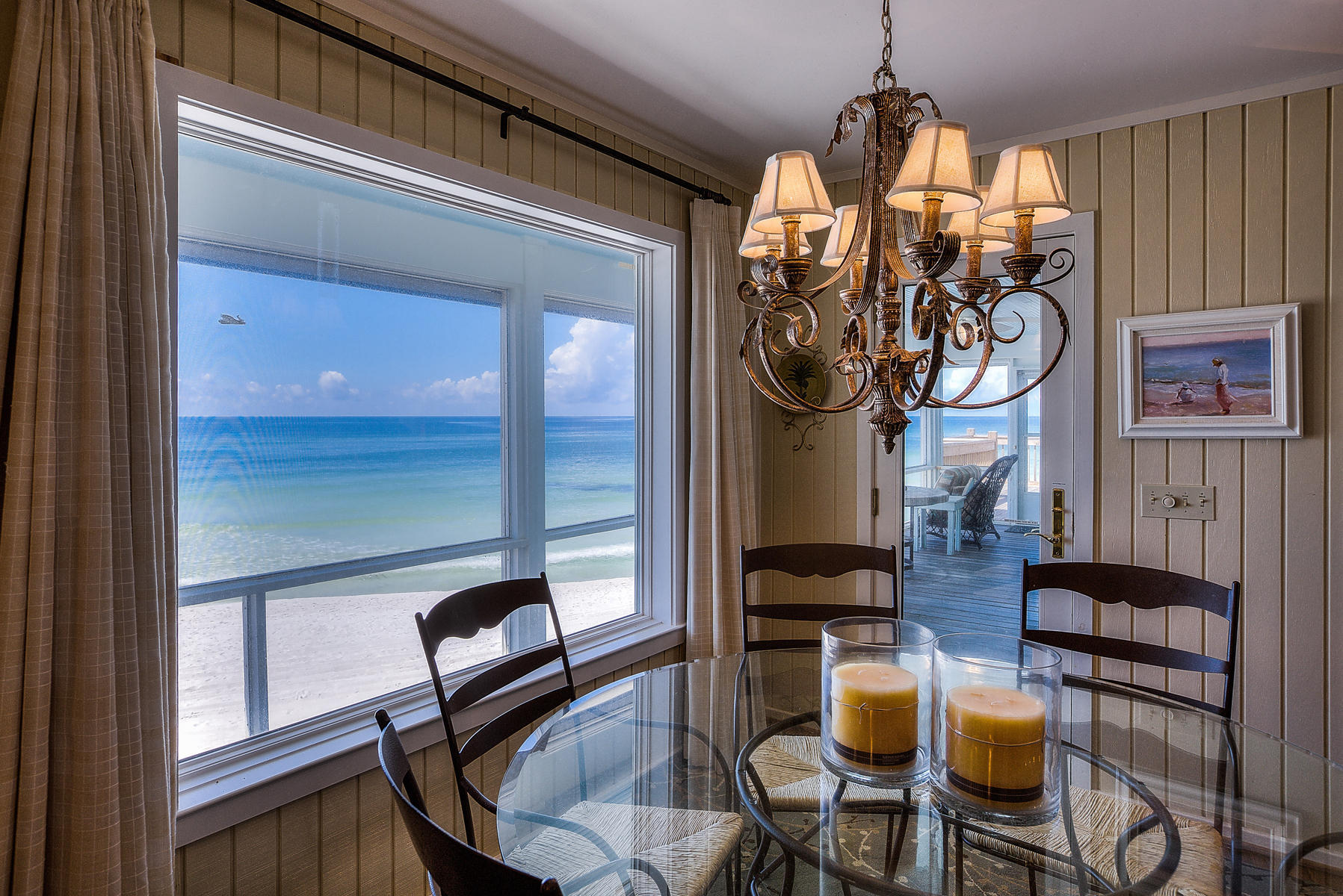 325 Pompano Street Inlet Beach, FL 32461 - Photo 9 of 49 a view of a dining room with furniture and chandelier