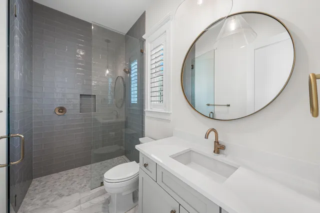 a view of swimming pool with outdoor seating and plants