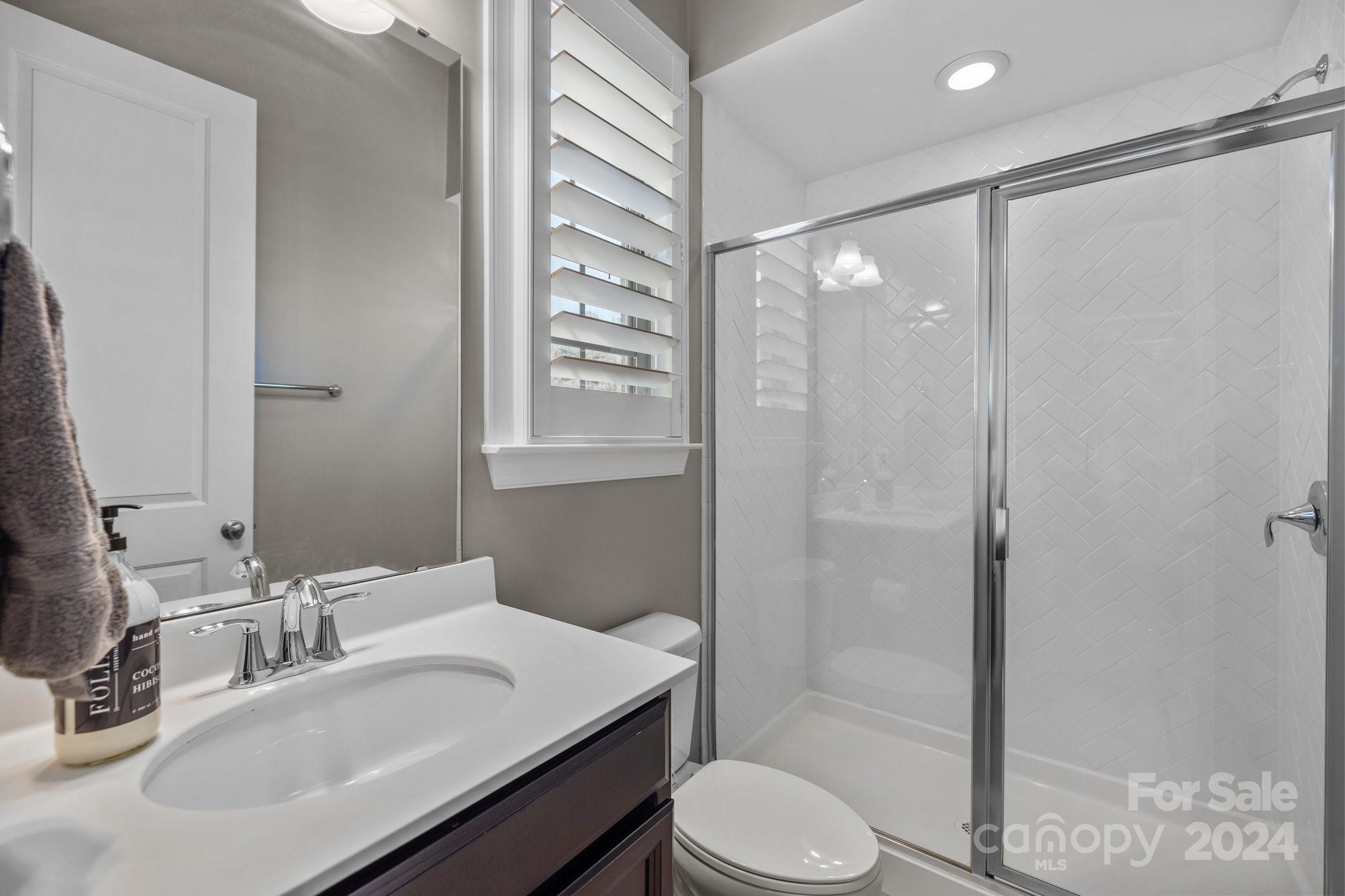 470 Langston Pl Drive Fort Mill, SC 29708 - Photo 15 of 40 a bathroom with a sink toilet and shower