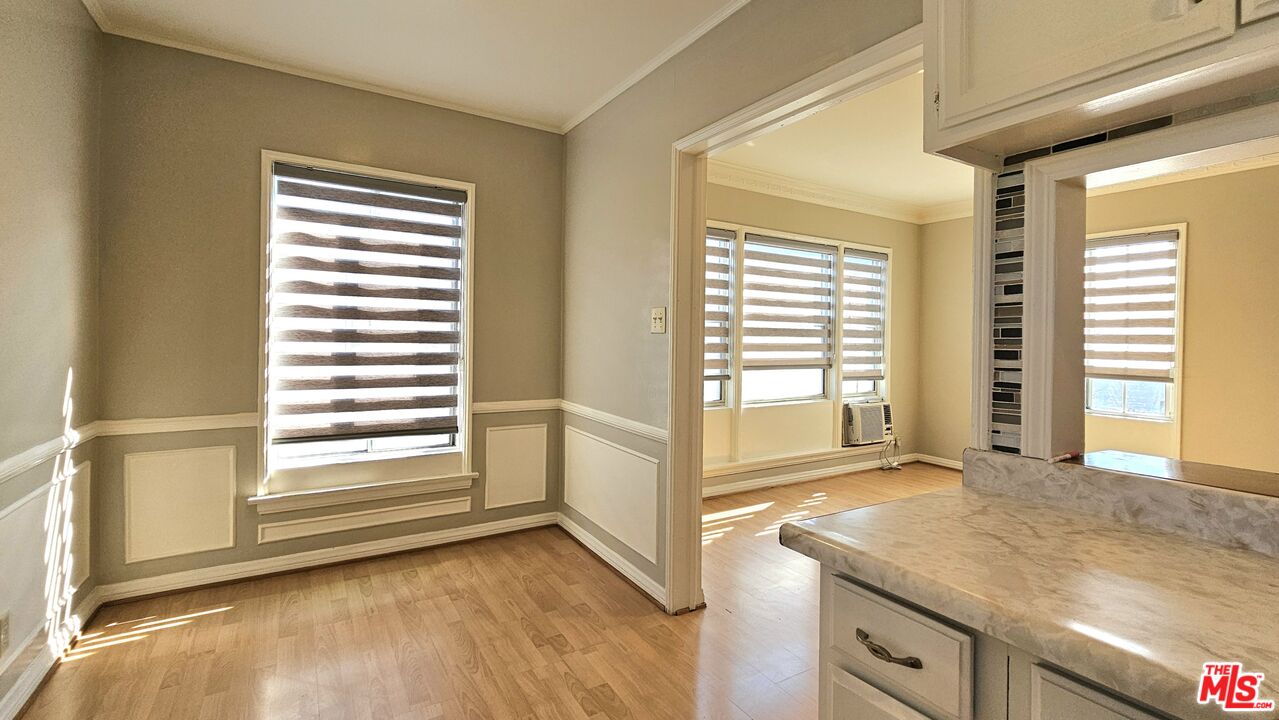 1022 South Norton Avenue, Unit C Los Angeles, CA 90019 - Photo 17 of 43 a view of a kitchen with a sink and dishwasher