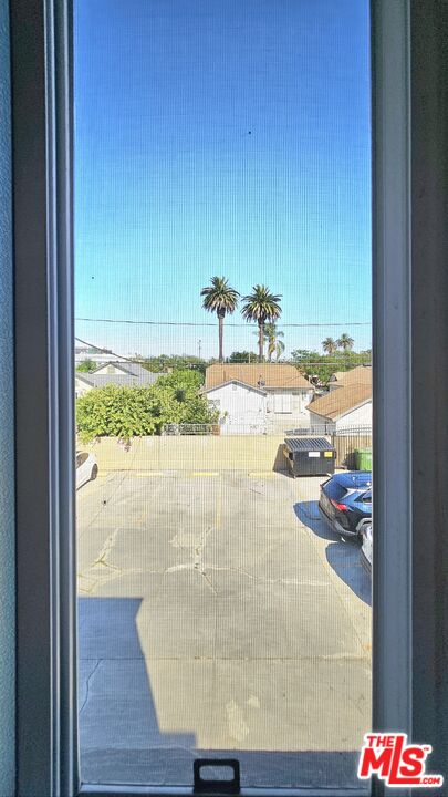 1022 South Norton Avenue, Unit C Los Angeles, CA 90019 - Photo 25 of 43 a view of a room with wooden floor