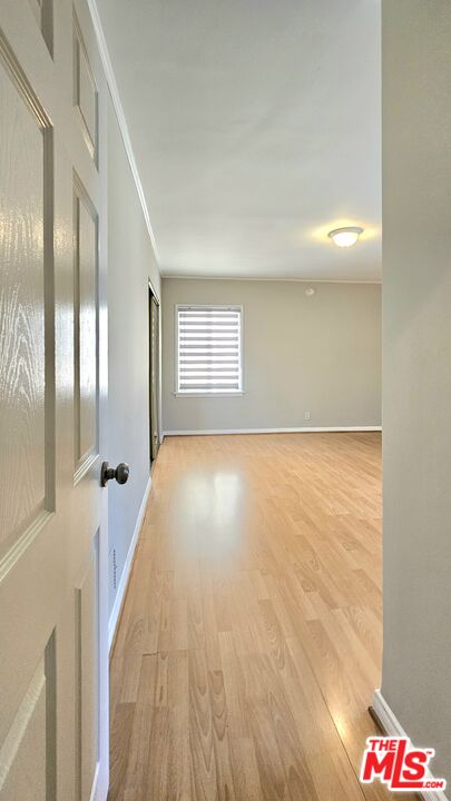 1022 South Norton Avenue, Unit C Los Angeles, CA 90019 - Photo 28 of 43 a view of an empty room and window