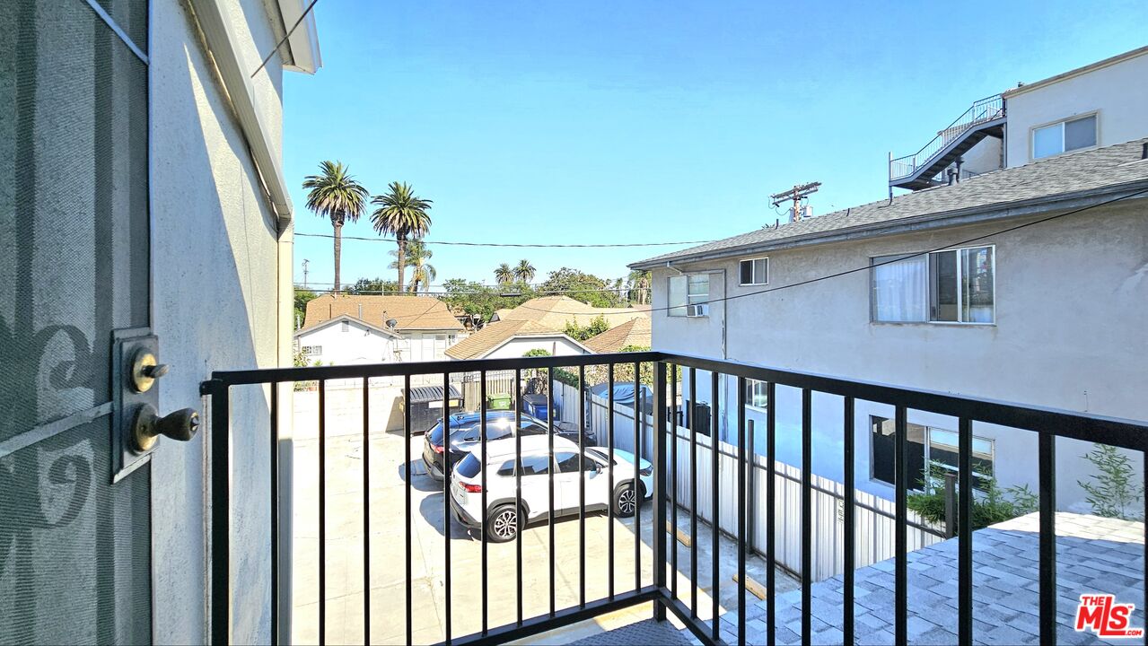 1022 South Norton Avenue, Unit C Los Angeles, CA 90019 - Photo 3 of 43 a view of a balcony