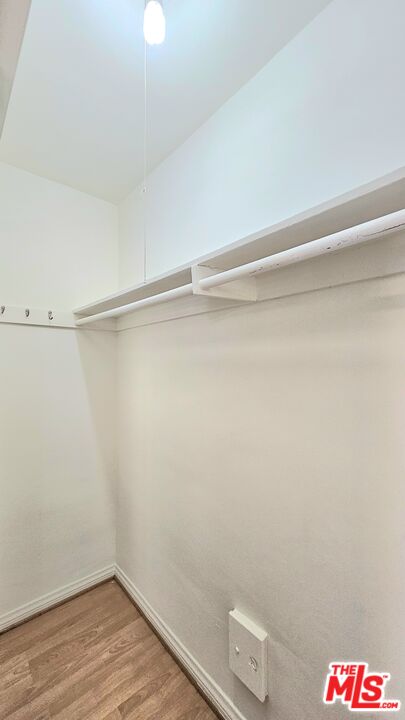 1022 South Norton Avenue, Unit C Los Angeles, CA 90019 - Photo 34 of 43 a view of an empty walk in closet