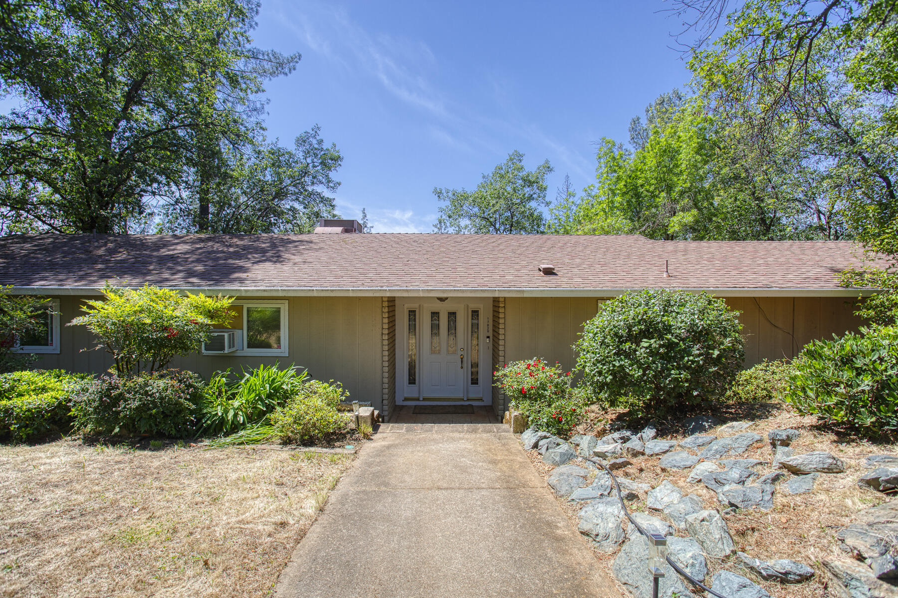 17829 Ranchera Road Shasta Lake, CA 96019 - Photo 1 of 39 front view of a house with a yard