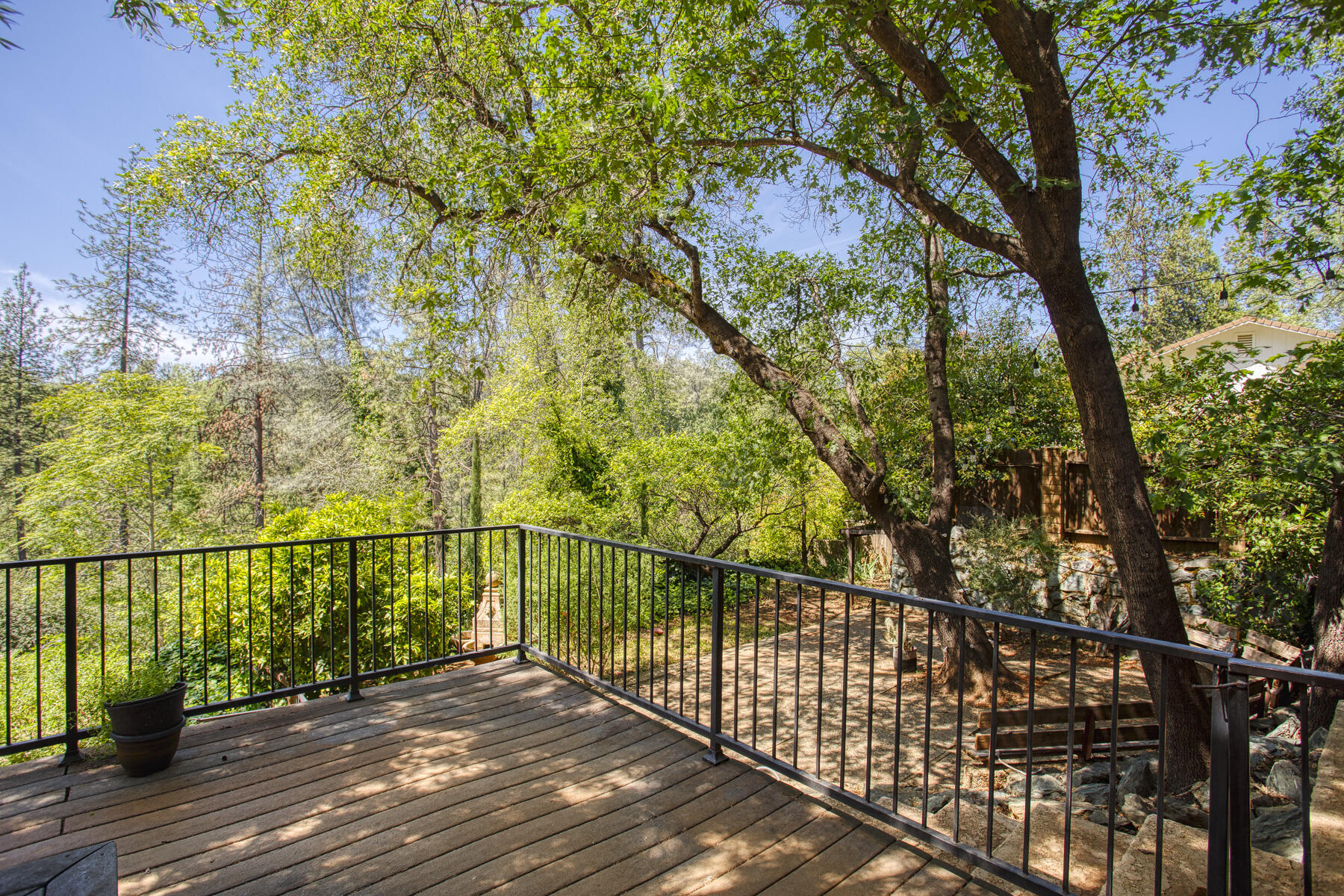 17829 Ranchera Road Shasta Lake, CA 96019 - Photo 26 of 39 a view of balcony with wooden floor and fence