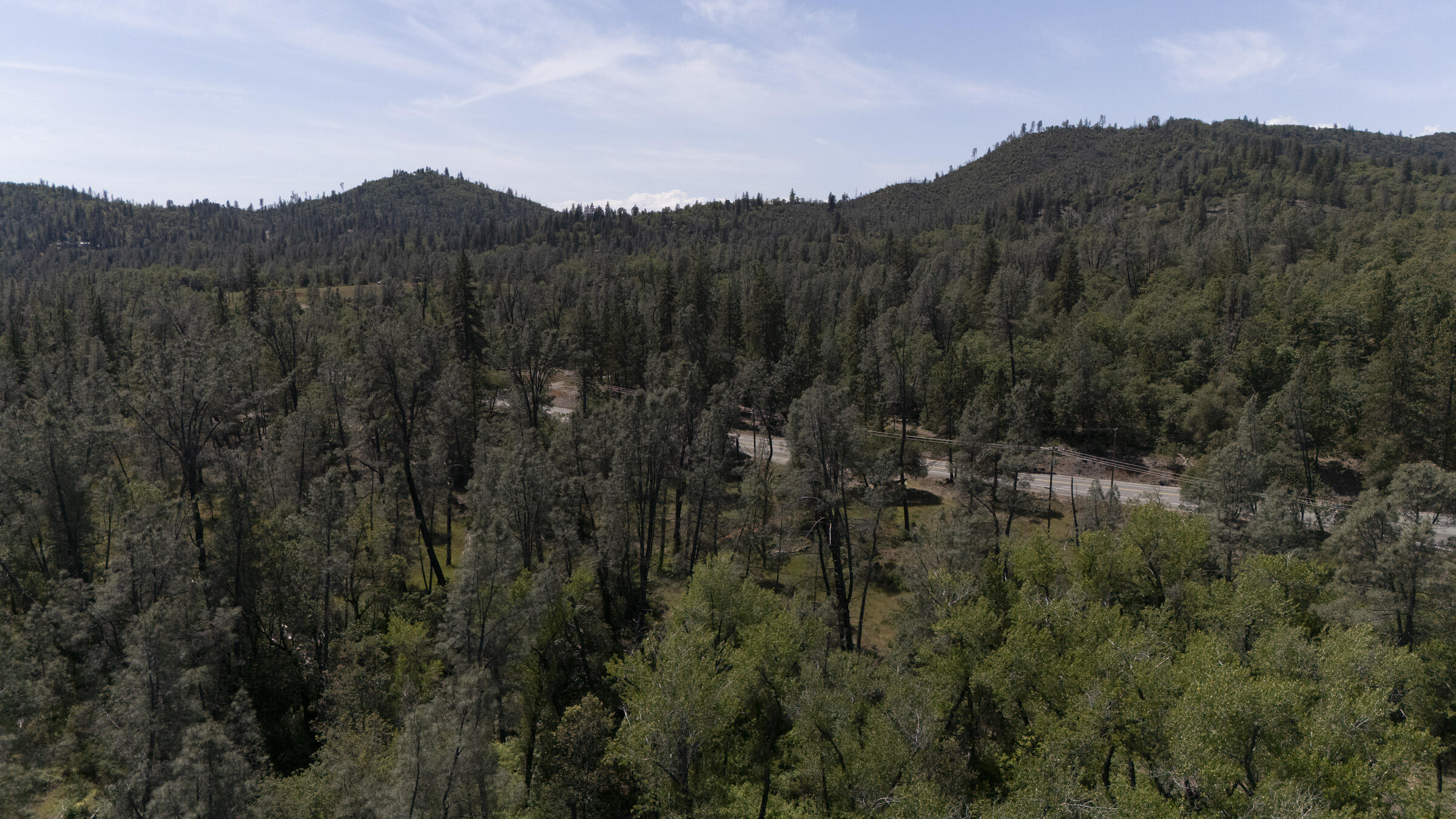 17829 Ranchera Road Shasta Lake, CA 96019 - Photo 36 of 39 a view of a city with lush green forest