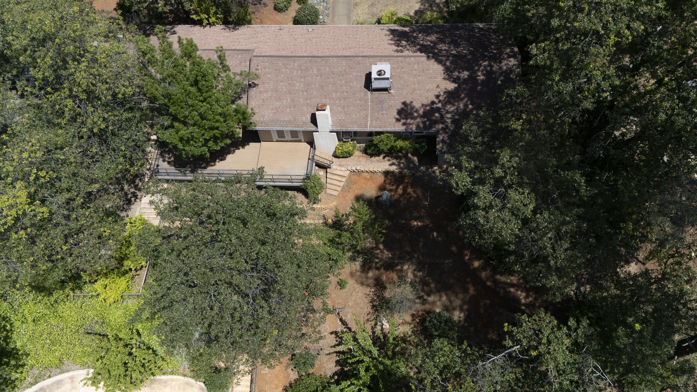 17829 Ranchera Road Shasta Lake, CA 96019 - Photo 39 of 39 an aerial view of a house with a yard and outdoor seating