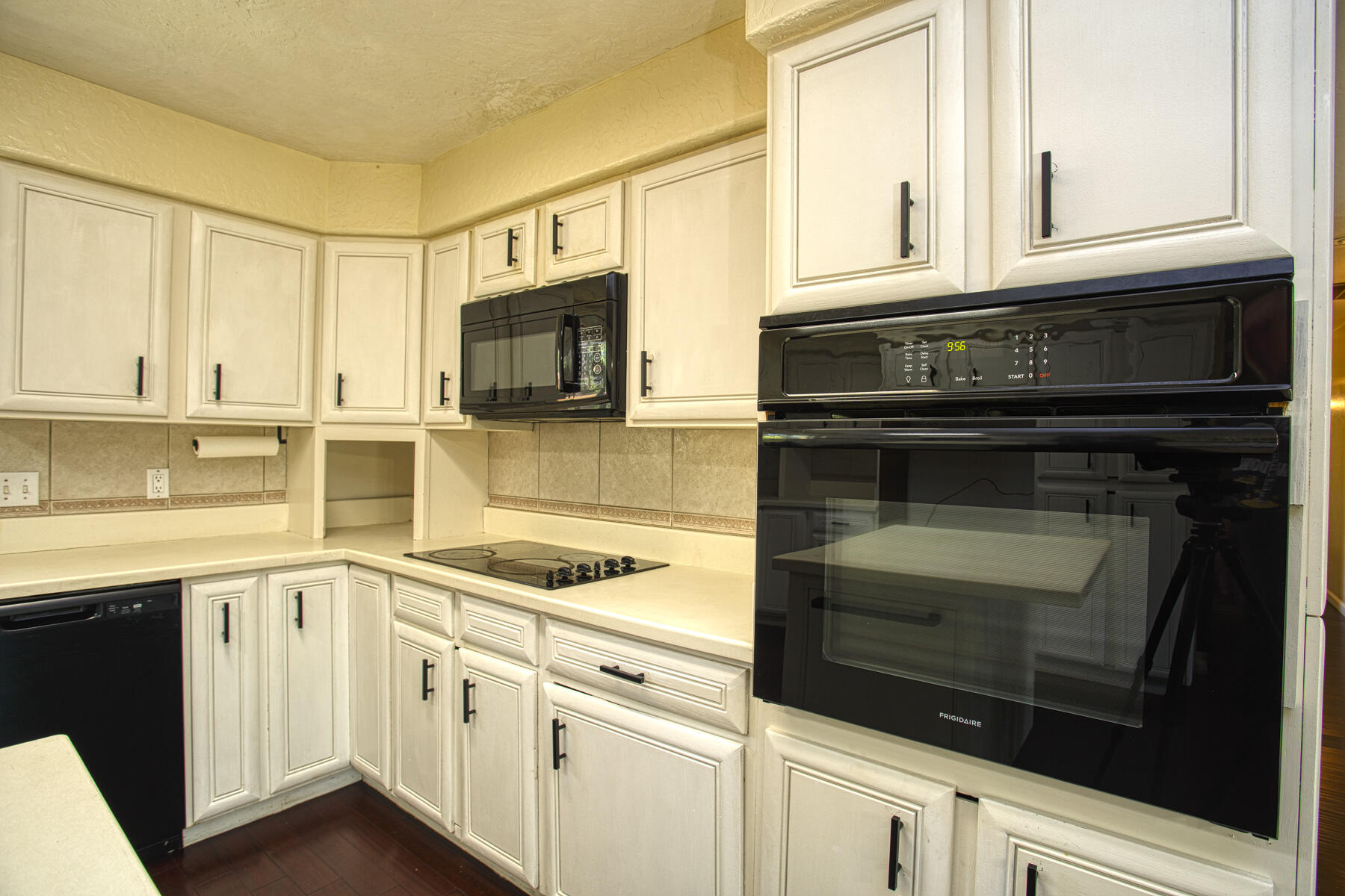 17829 Ranchera Road Shasta Lake, CA 96019 - Photo 6 of 39 a kitchen with white cabinets and appliances