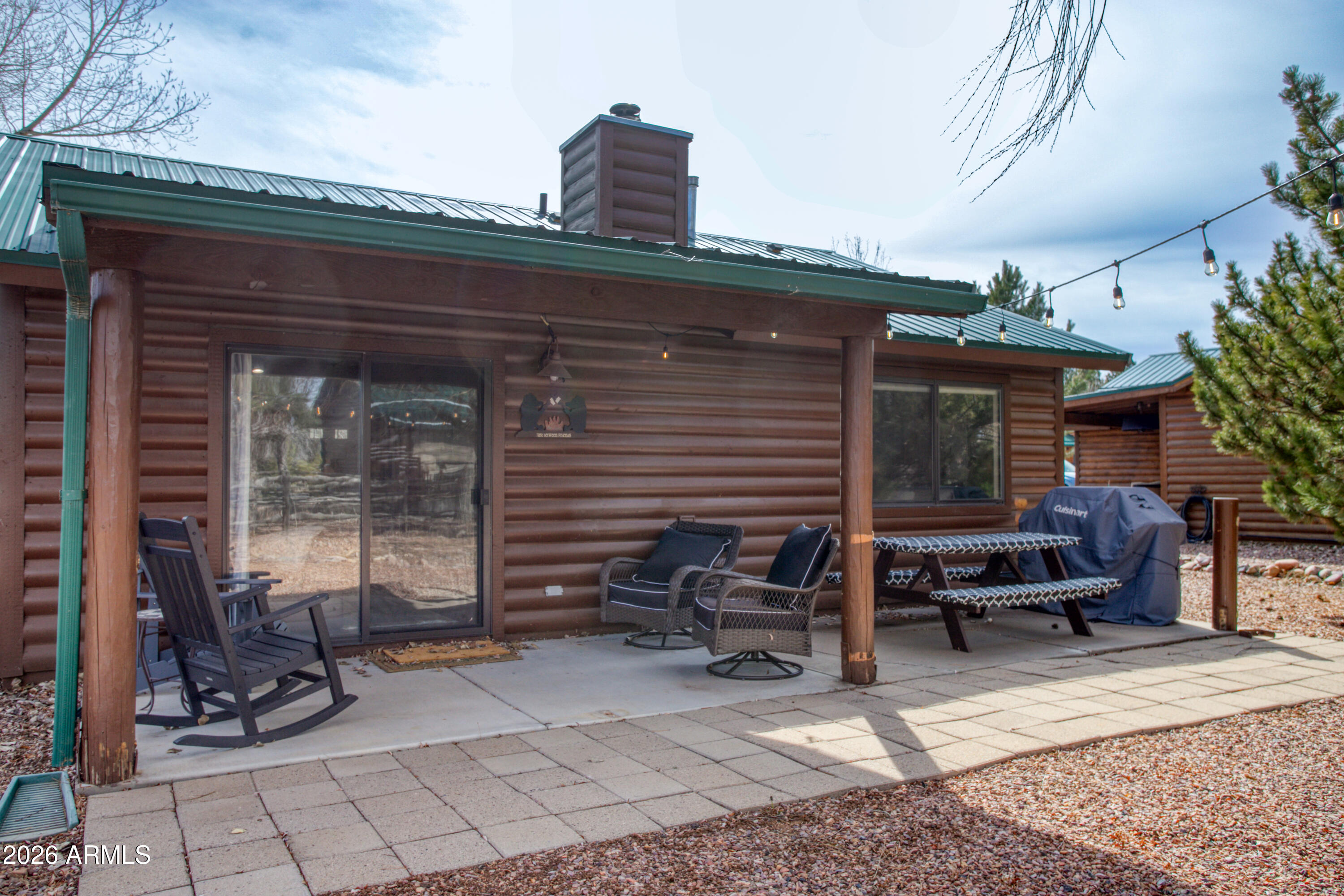 2342 South Buffalo Loop Overgaard, AZ 85933 - Photo 19 of 27 a view of a patio with table and chairs and potted plants