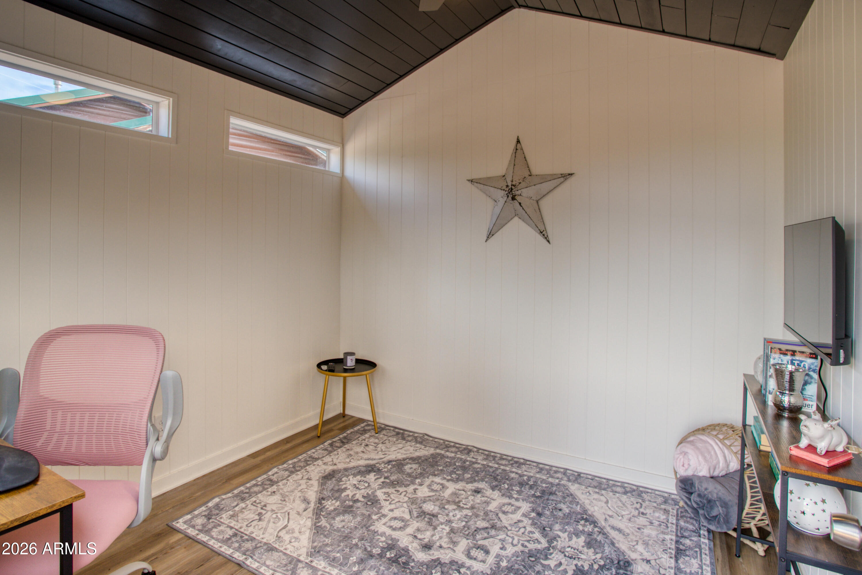 2342 South Buffalo Loop Overgaard, AZ 85933 - Photo 24 of 27 a very nice looking room with a ceiling fan