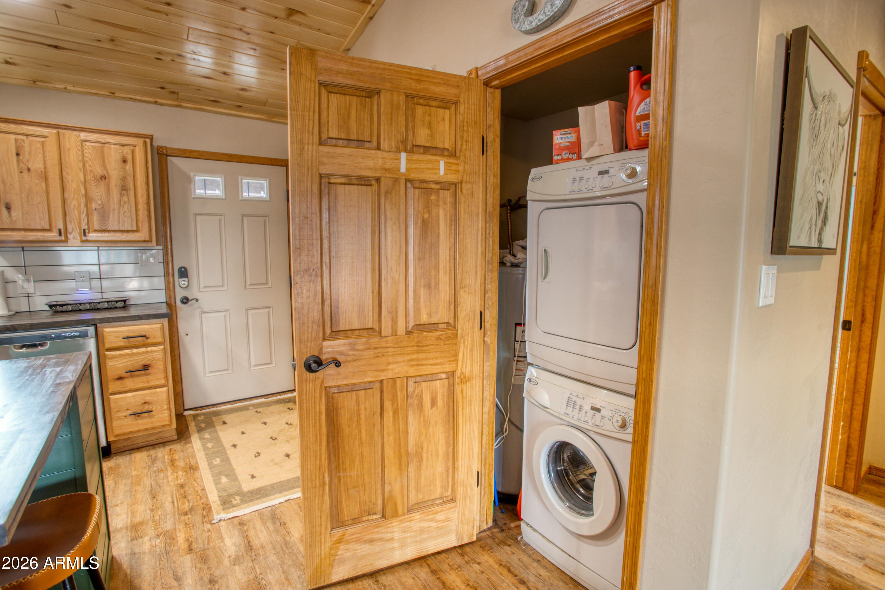2342 South Buffalo Loop Overgaard, AZ 85933 - Photo 10 of 27 a utility room with dryer and washer