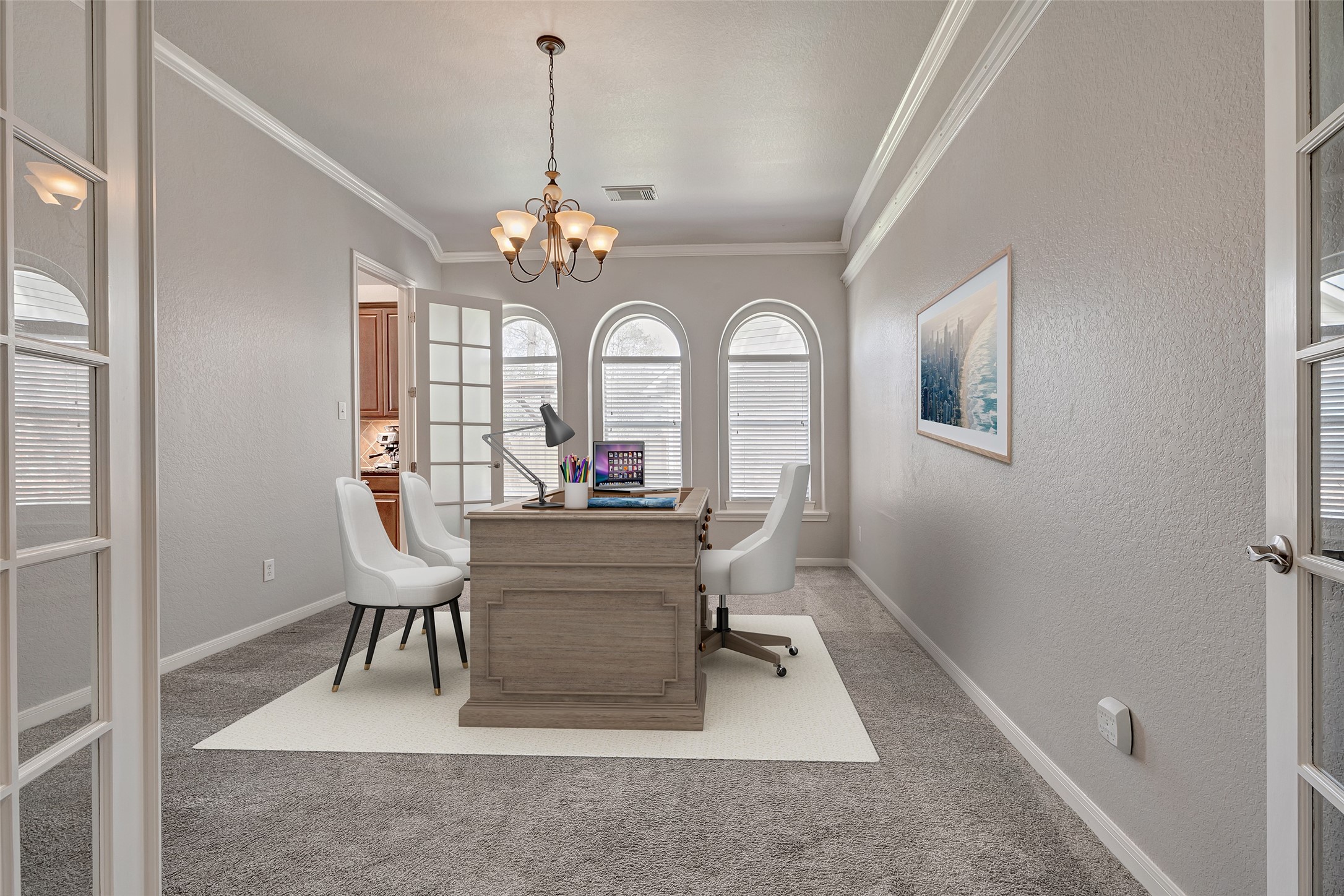 27 Planchard Court Spring, TX 77382 - Photo 2 of 16 a view of a livingroom with furniture a chandelier and wooden floor