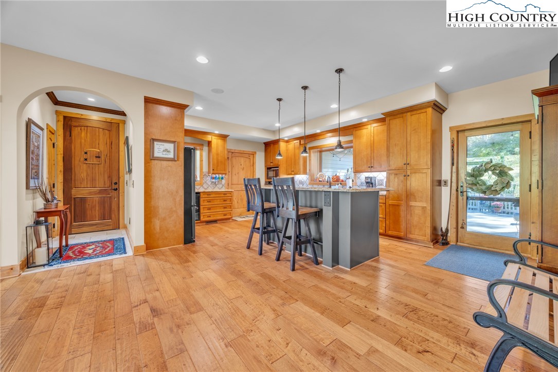 2650 Carson Woods Road Laurel Springs, NC 28644 - Photo 7 of 50 a view of a kitchen with furniture and a table