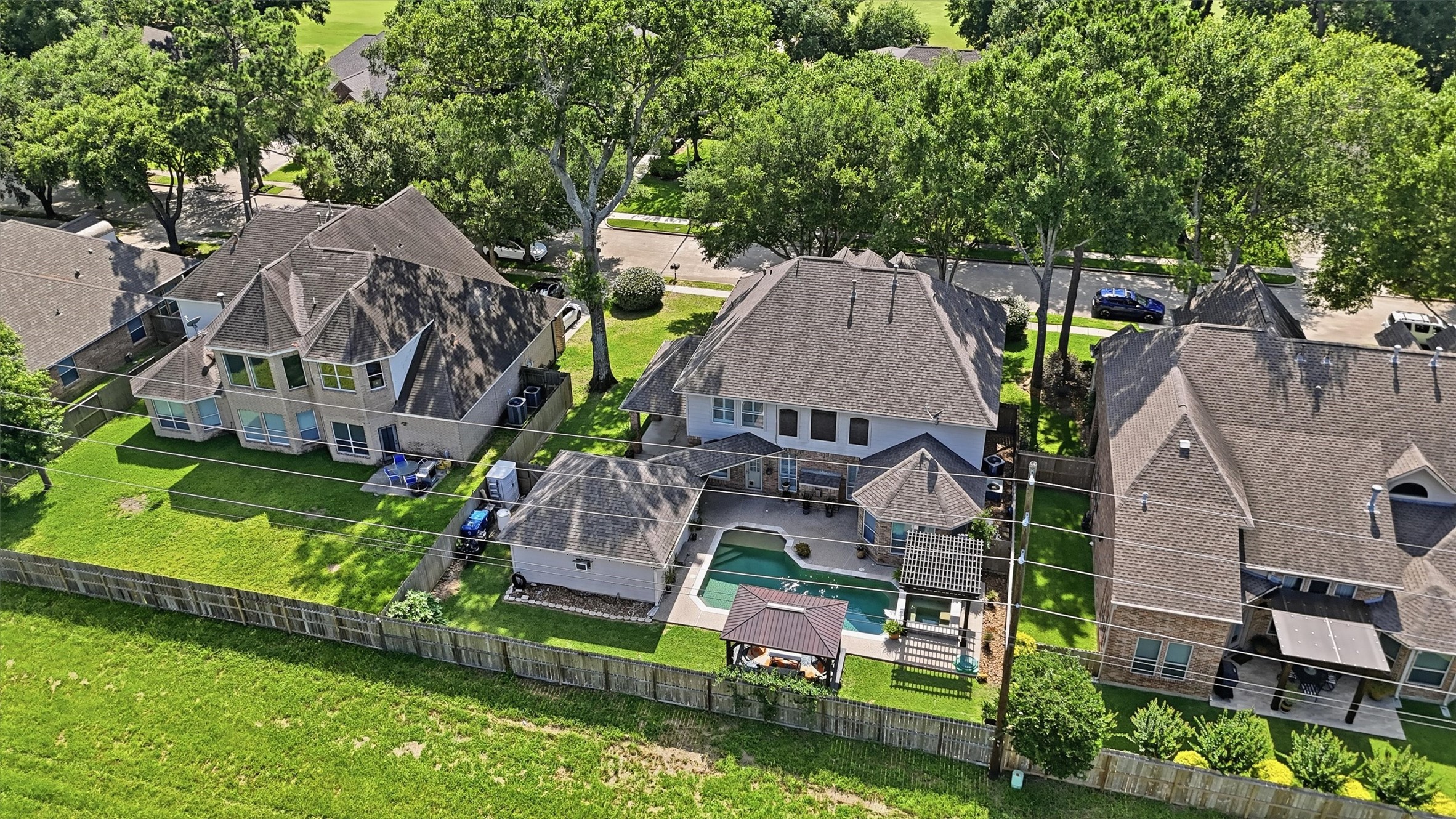 25181 Ramrock Drive Porter, TX 77365 - Photo 31 of 35 an aerial view of a house with garden space and street view