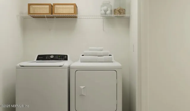 a bathroom with a toilet and a shower curtain