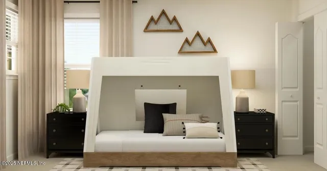 a bedroom with a bed and wall painting