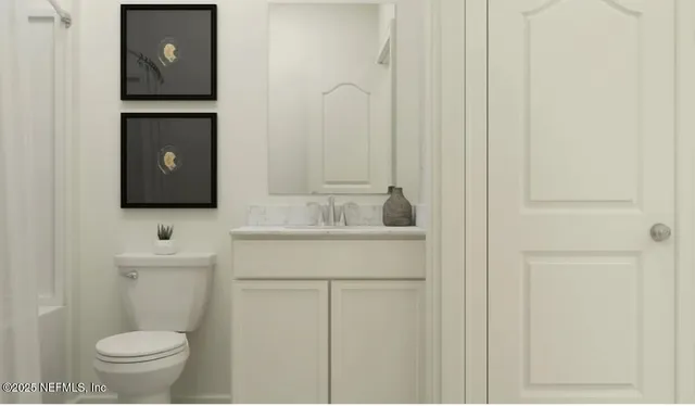 a bathroom with a granite countertop sink a mirror and a shower