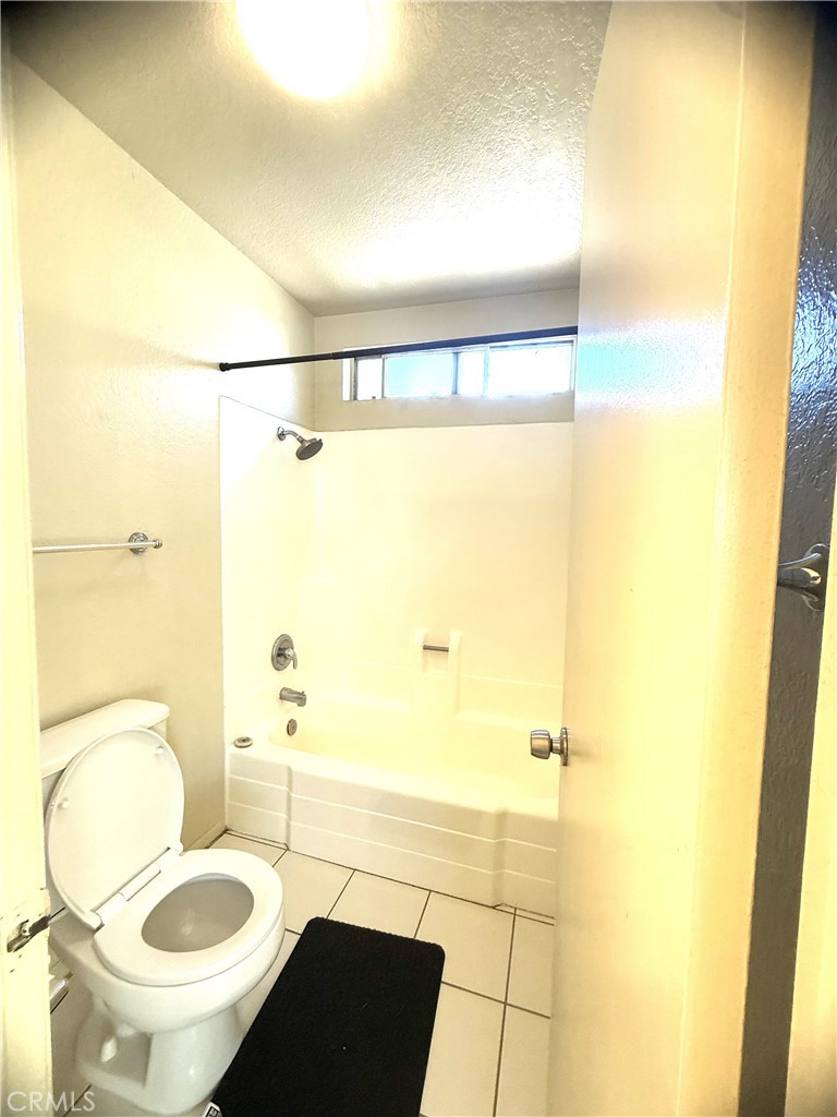 2511 Florida Street, Unit 1 Huntington Beach, CA 92648 - Photo 12 of 13 a bathroom with a sink and a toilet