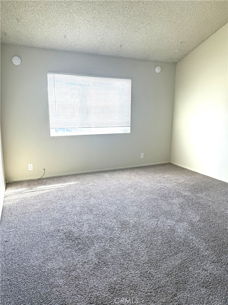 2511 Florida Street, Unit 1 Huntington Beach, CA 92648 - Photo 10 of 13 an empty room with a window