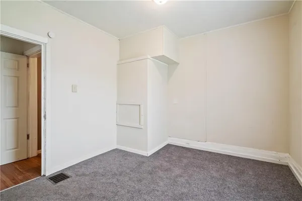 an empty room with closet