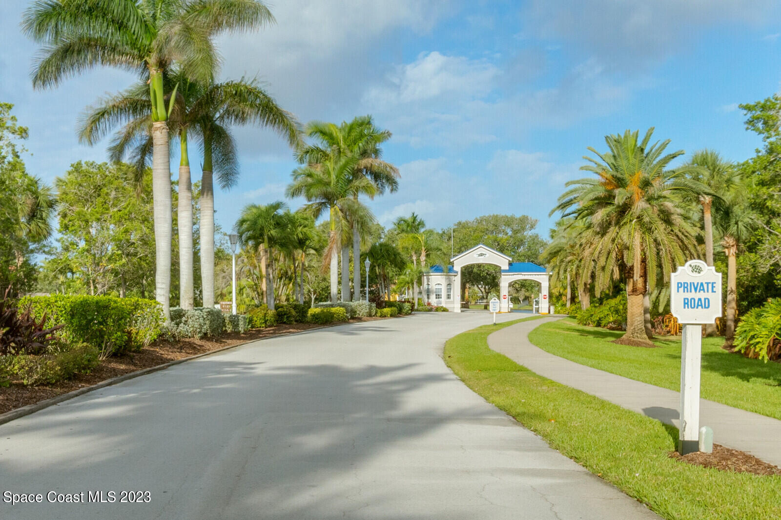 618 Tortoise Way Satellite Beach, FL 32937 - Photo 11 of 21 a front view of multi story residential apartment building with yard and green space