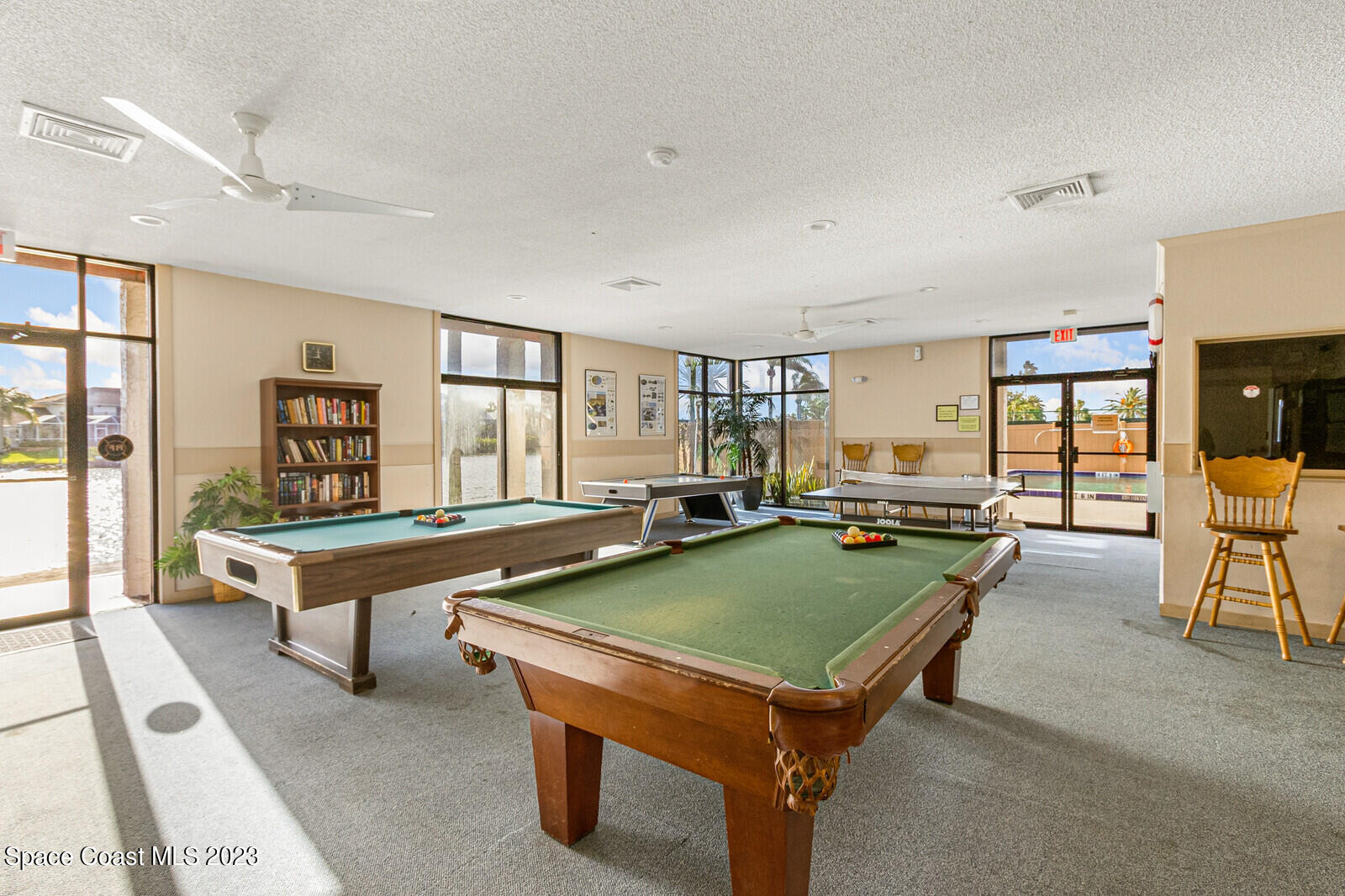 618 Tortoise Way Satellite Beach, FL 32937 - Photo 15 of 21 a room with pool tables and windows