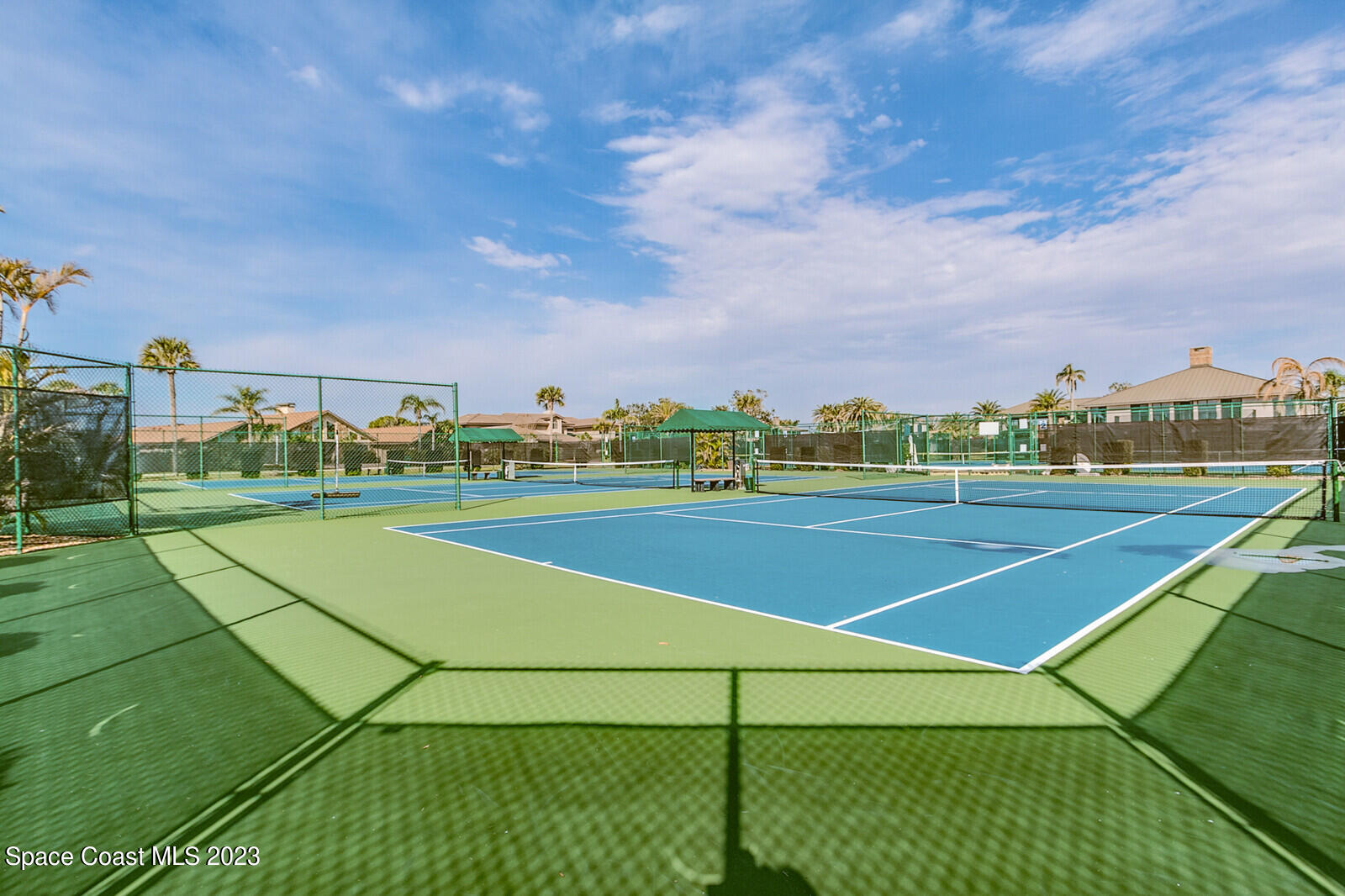 618 Tortoise Way Satellite Beach, FL 32937 - Photo 19 of 21 a view of an outdoor space and tennis court