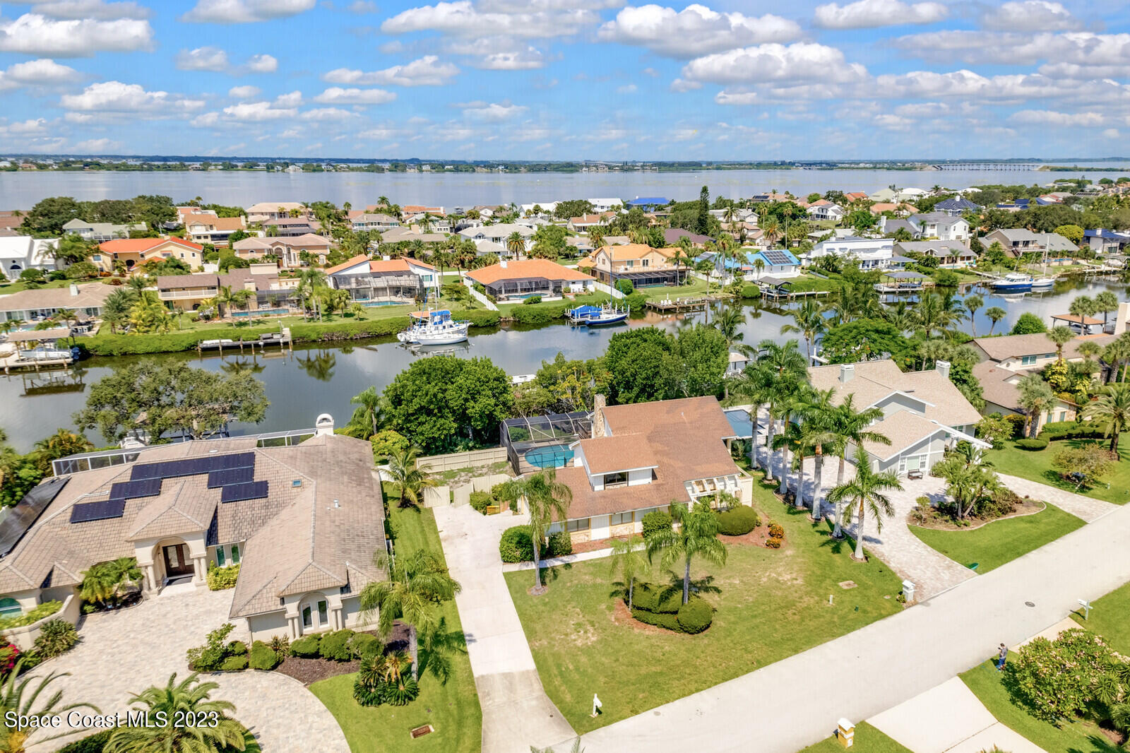 618 Tortoise Way Satellite Beach, FL 32937 - Photo 2 of 21 an aerial view of residential houses with outdoor space