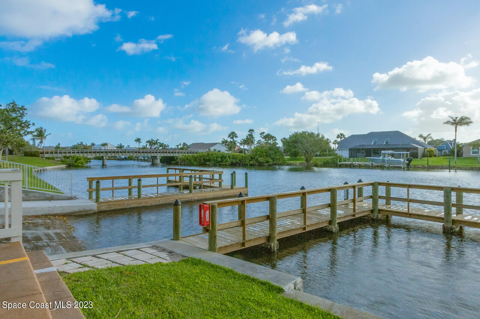 618 Tortoise Way Satellite Beach, FL 32937 - Photo 21 of 21 a view of a lake with houses in the back