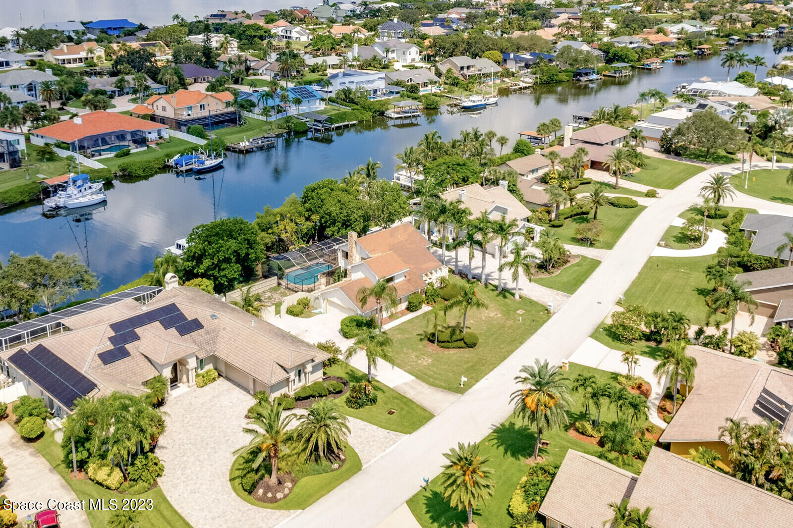 618 Tortoise Way Satellite Beach, FL 32937 - Photo 3 of 21 an aerial view of a house with a lake view