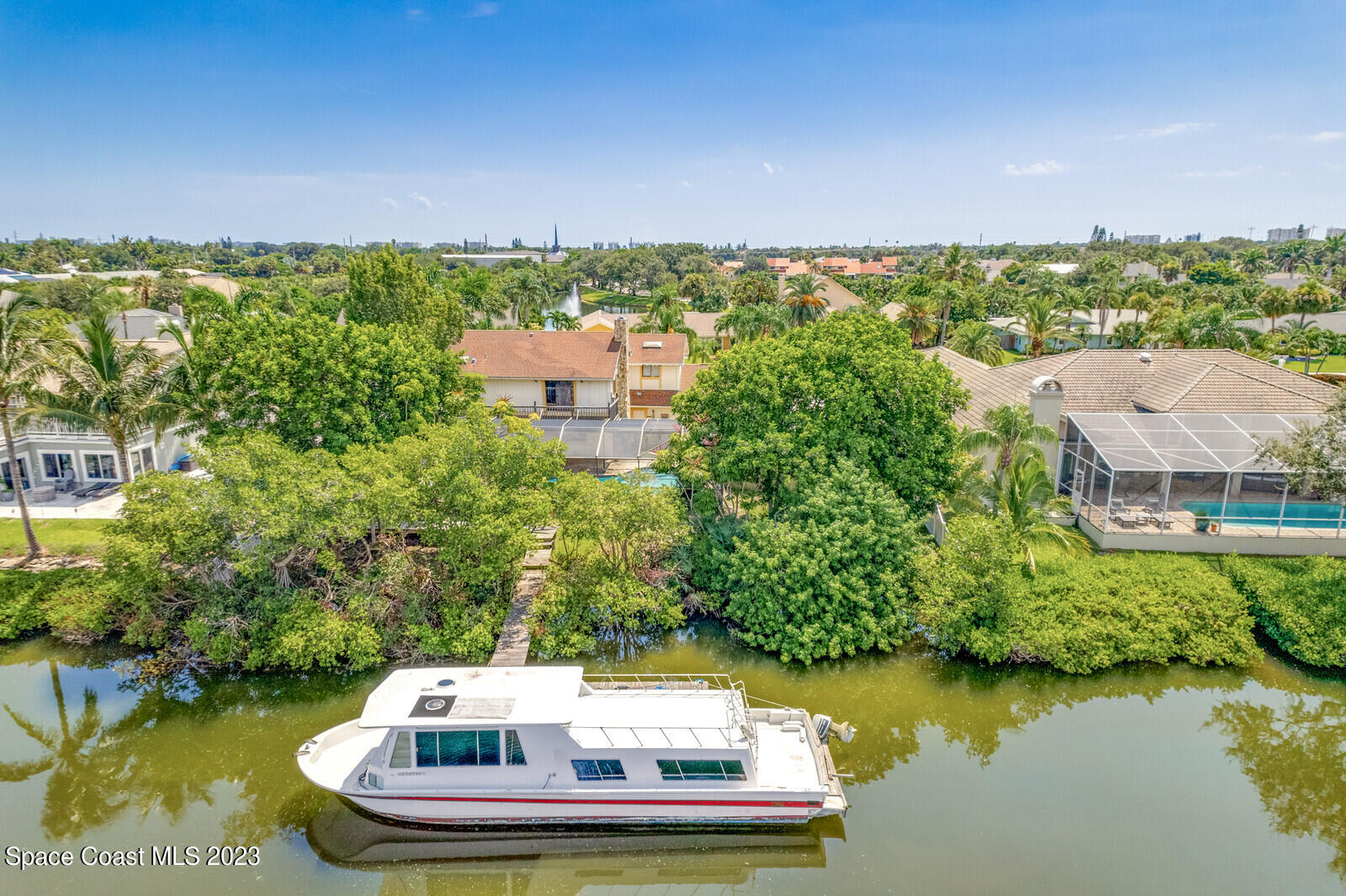 618 Tortoise Way Satellite Beach, FL 32937 - Photo 7 of 21 a view of a lake with a city