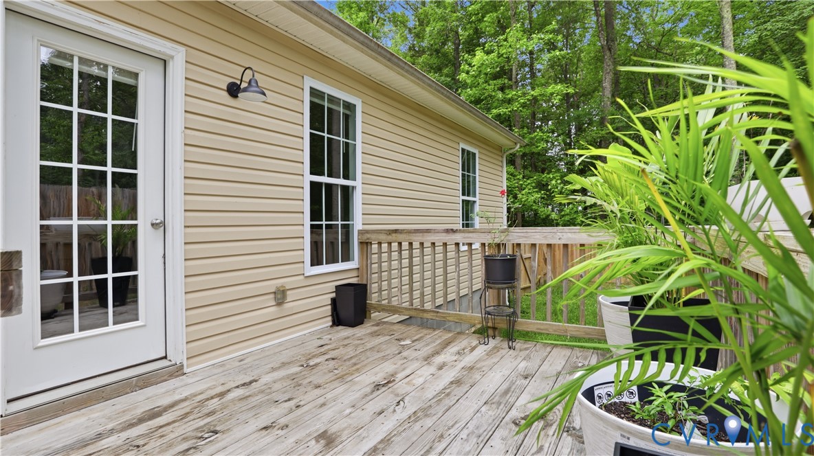 2406 Emanuel Church Road Powhatan, VA 23139 - Photo 35 of 48 Wood deck featuring a white paneled door with grid