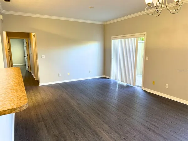 a view of a livingroom with wooden floor