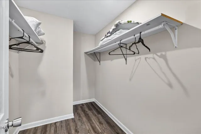 a view of small space with racks on the wall